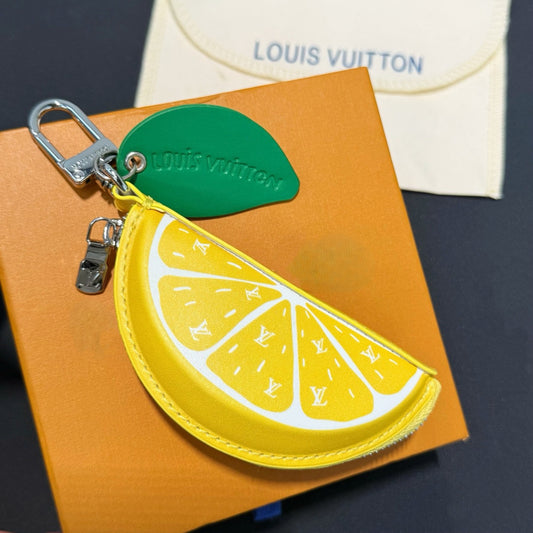 half lemon bag charm