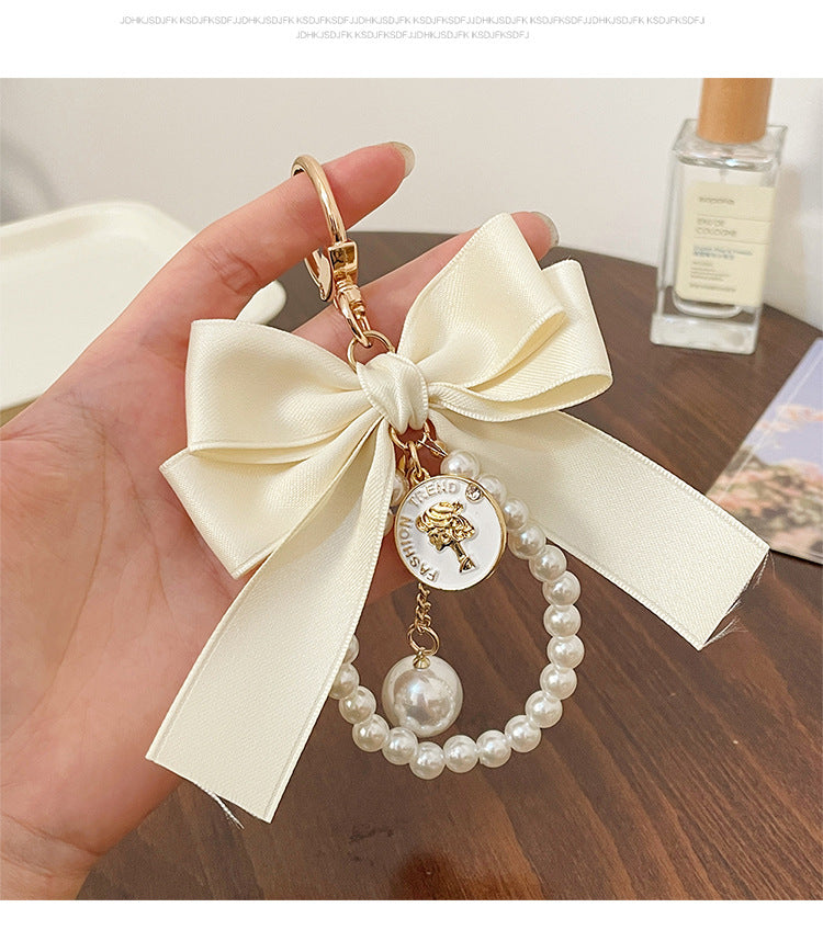 Mini Key Chains-Large Bow Tie Pearl String Key Chain Bag Charm